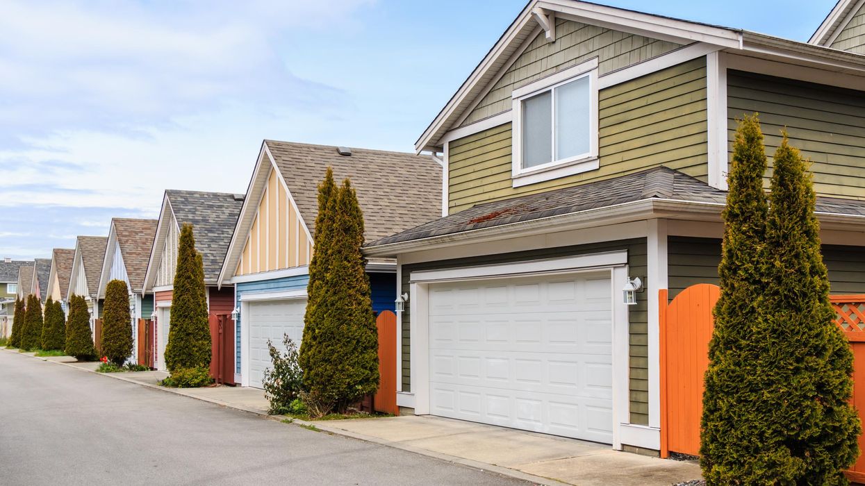 A residential street in B.C. with identical garages.