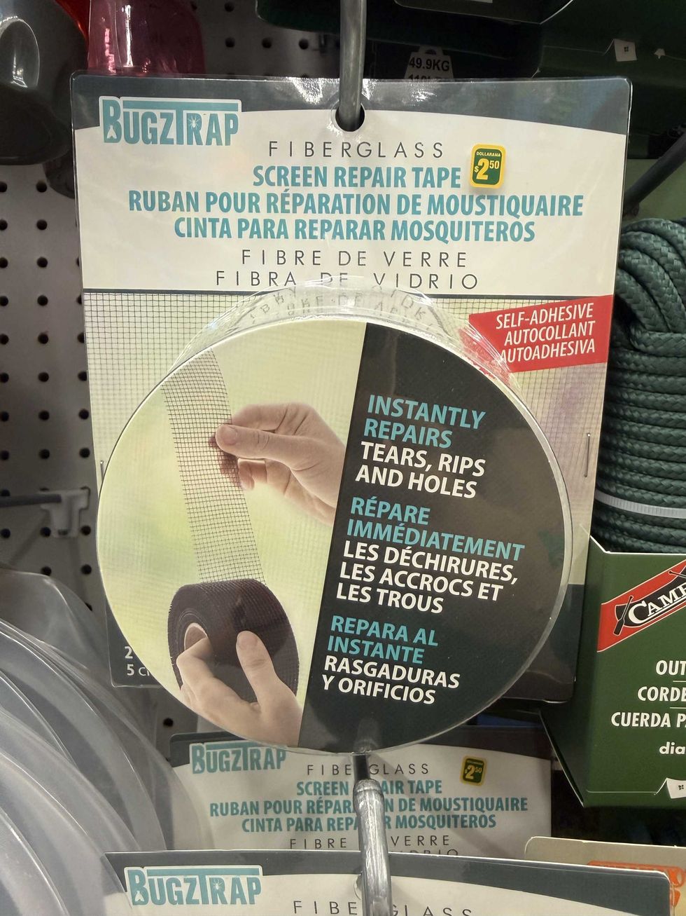 A roll of tape with holes in it and a label reading screen repair tape: instantly repairs tears, rips and holes.