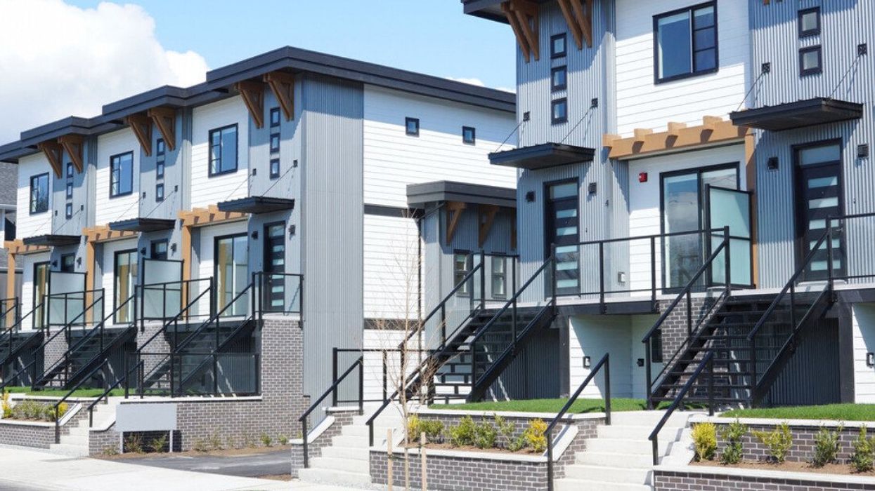 A row of modern-style townhomes.
