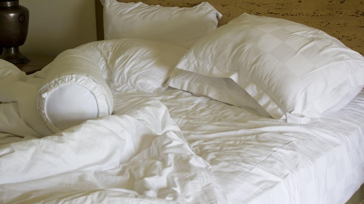 A rumpled bed.