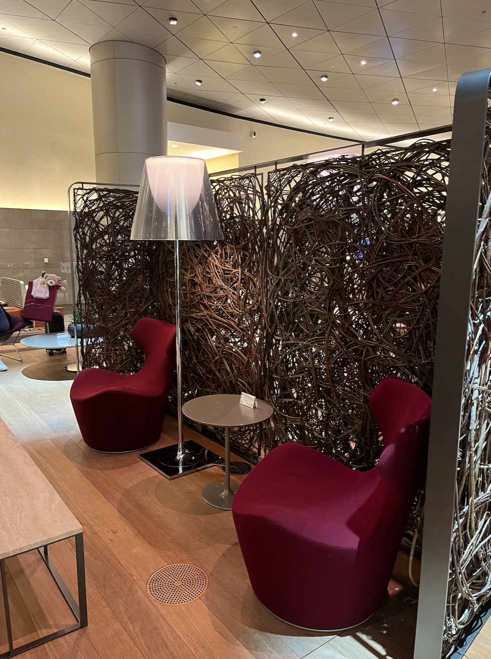 A secluded seating area at the Qatar Airways Al Mourjan Business Lounge.