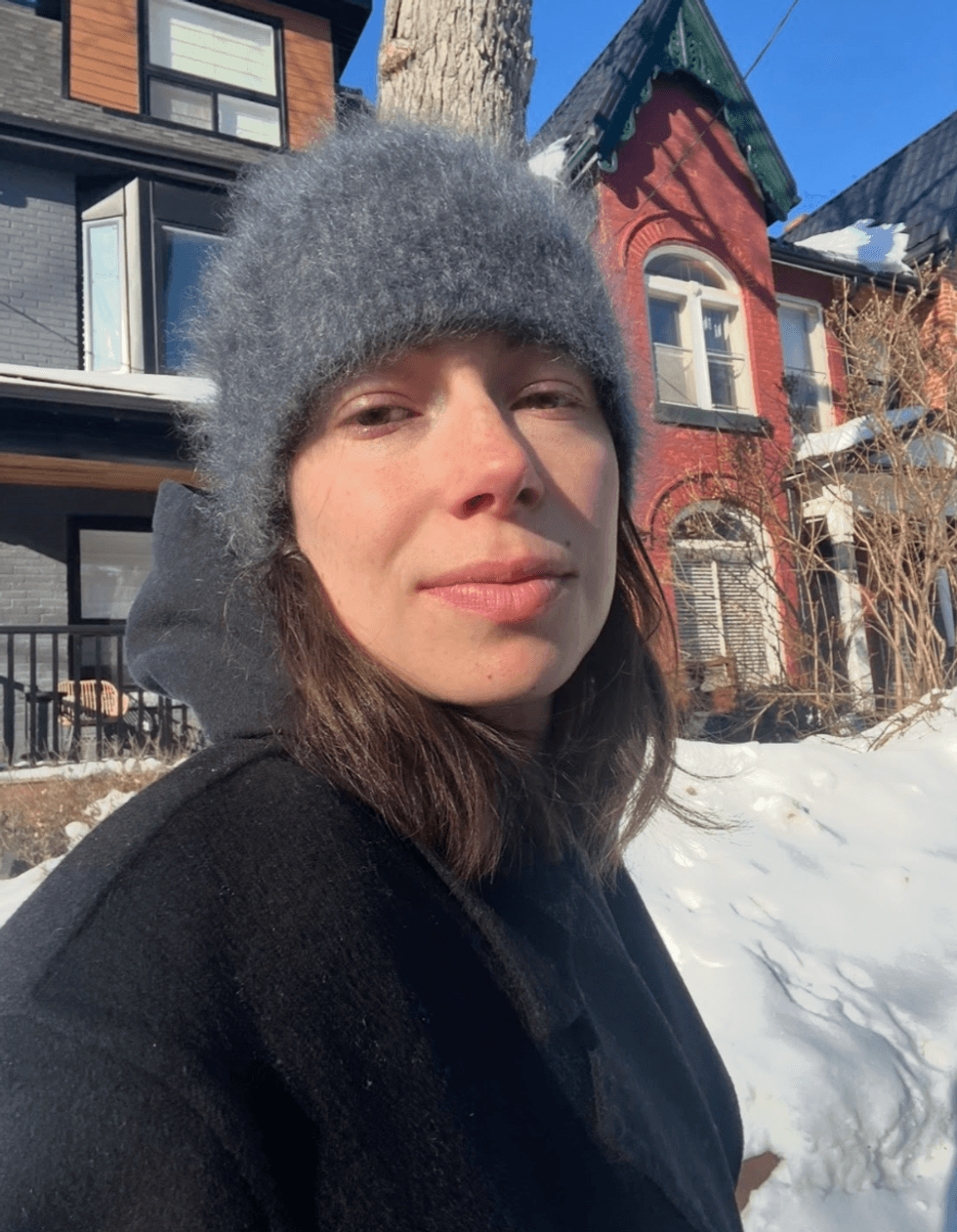 A selfie of someone in a winter hat.