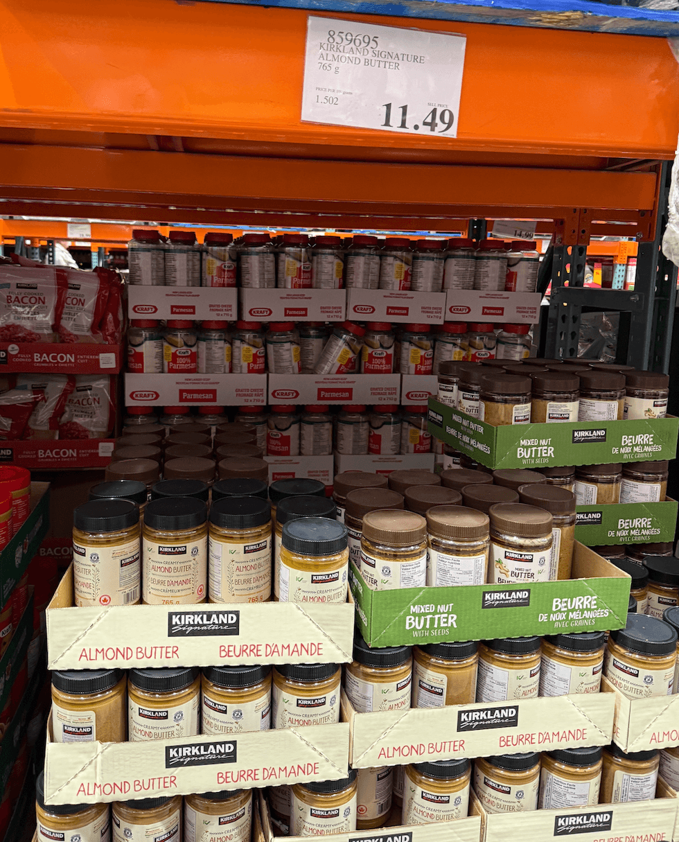 A shelf full of  almond butter.
