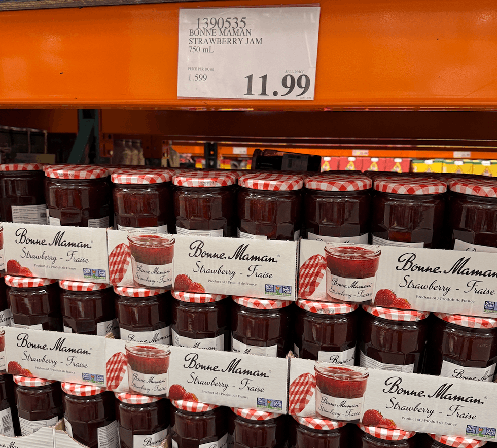 A shelf full of jam.