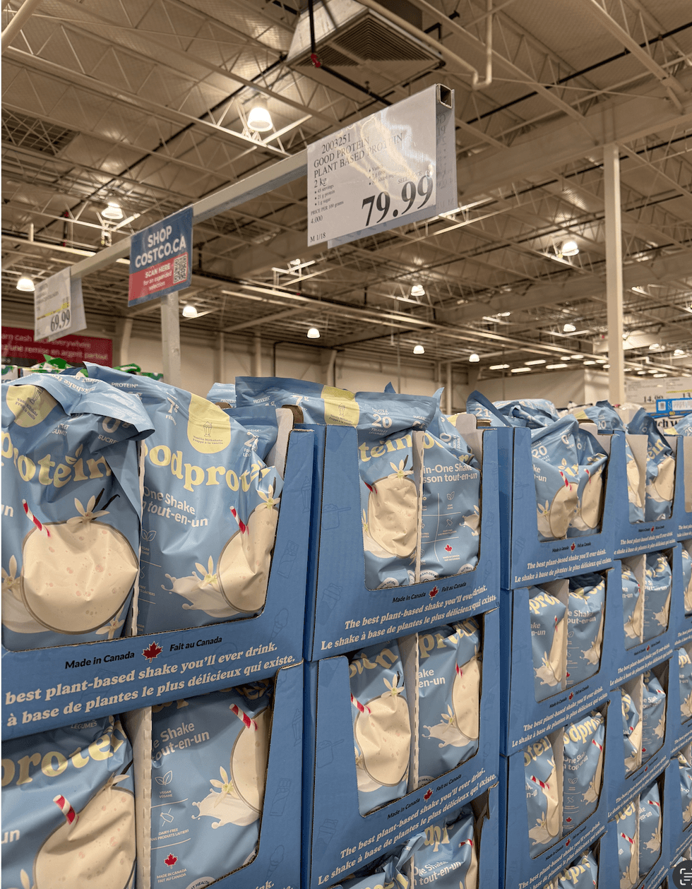 A shelf full of  protein powder.