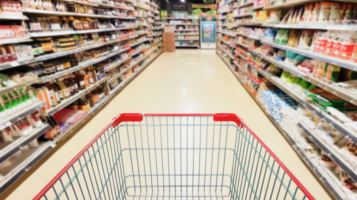 A shopping cart in a grocery store.