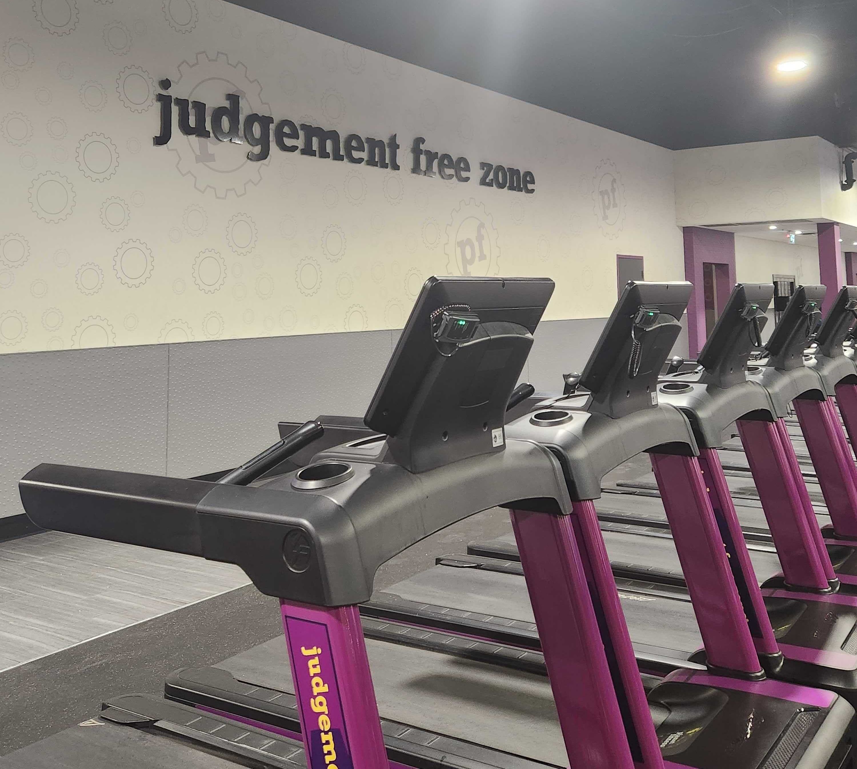 A sign that says "Judgement Free Zone" at a Planet Fitness in Toronto.