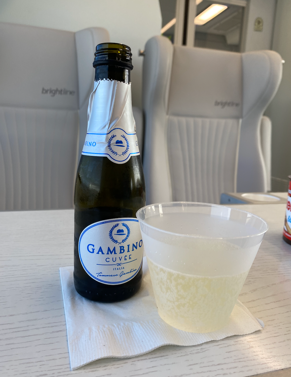 A small bottle of sparkling wine I ordered on the Brightline.