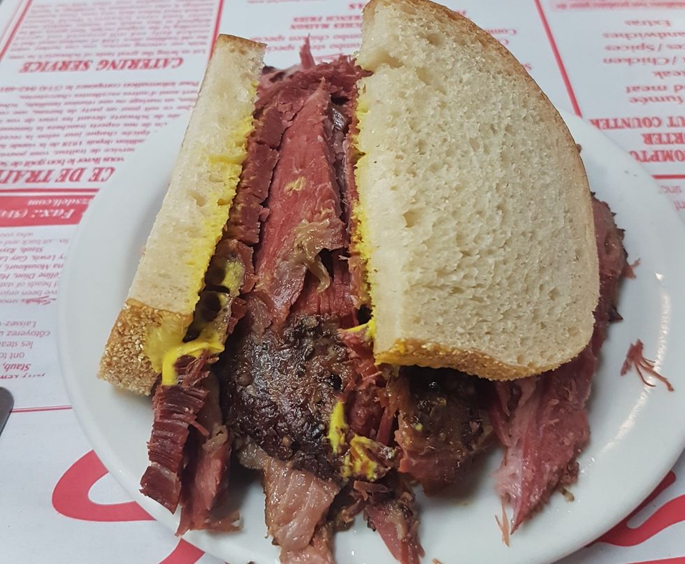 A smoked meat sandwich from Schwartz' Deli.