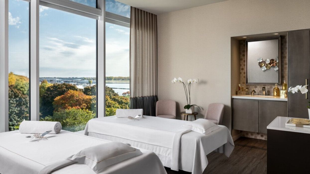 A spa room with lake views.
