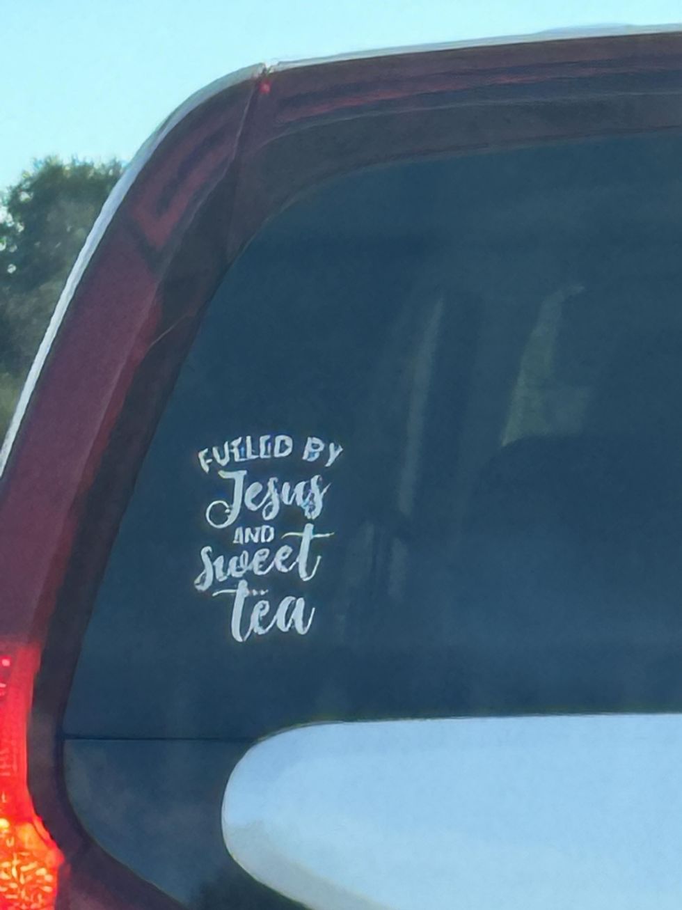A sticker on the back of a car.
