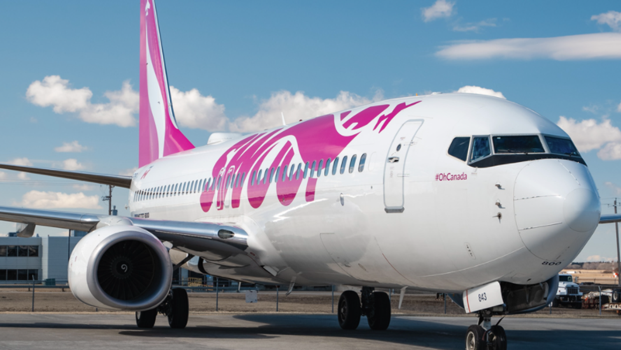 A Swoop plane on a runway.