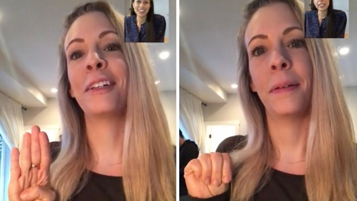A TikTok demonstrating the hand signal for domestic violence.