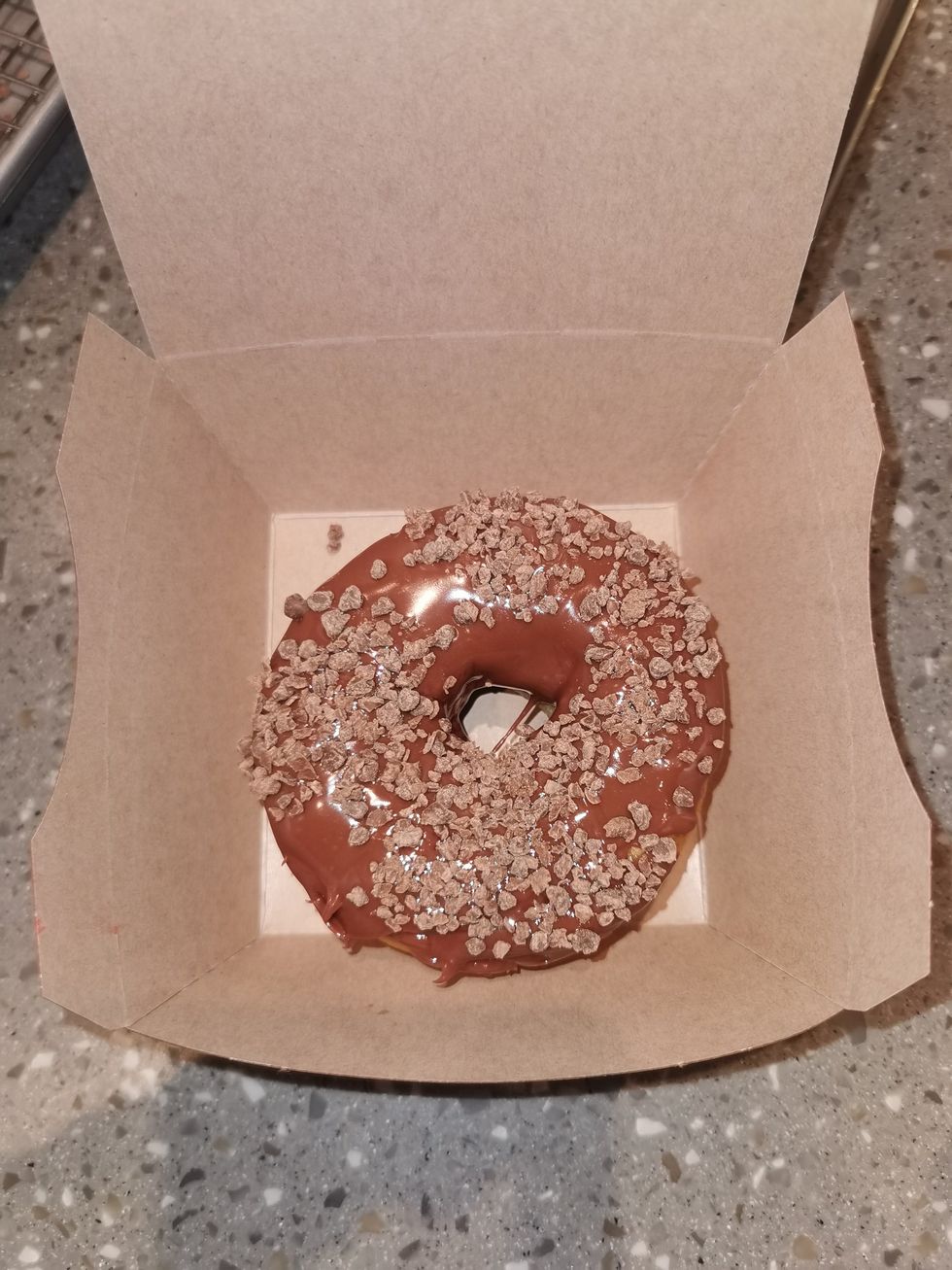 A Tim Hortons Chocolate Marshmallow Filled Ring Donut in a box.