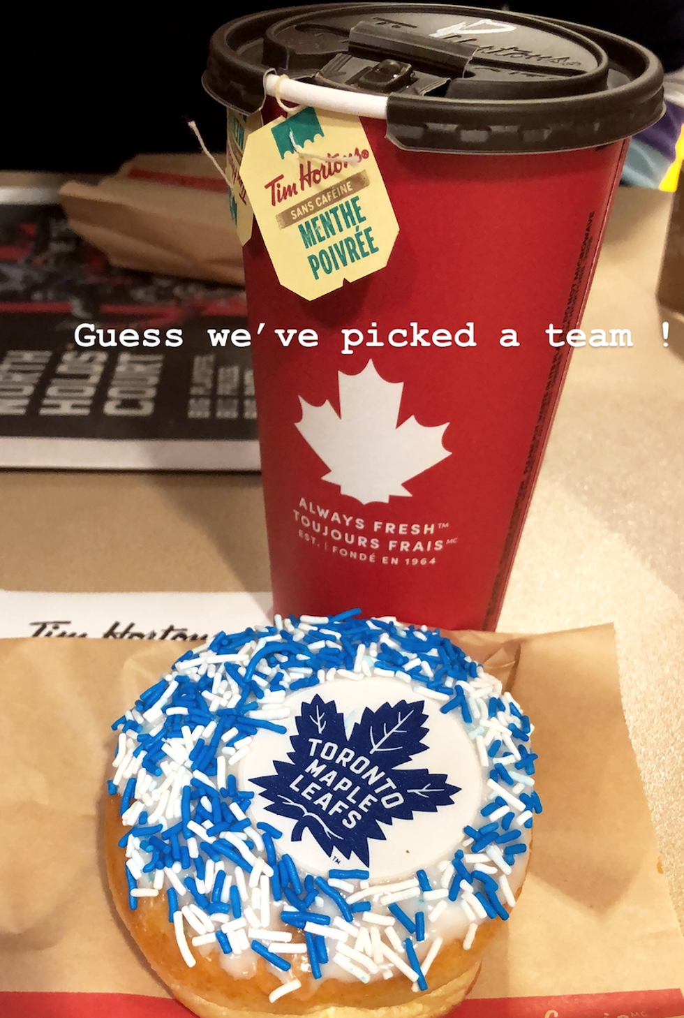 A Tim Hortons coffee and donut.