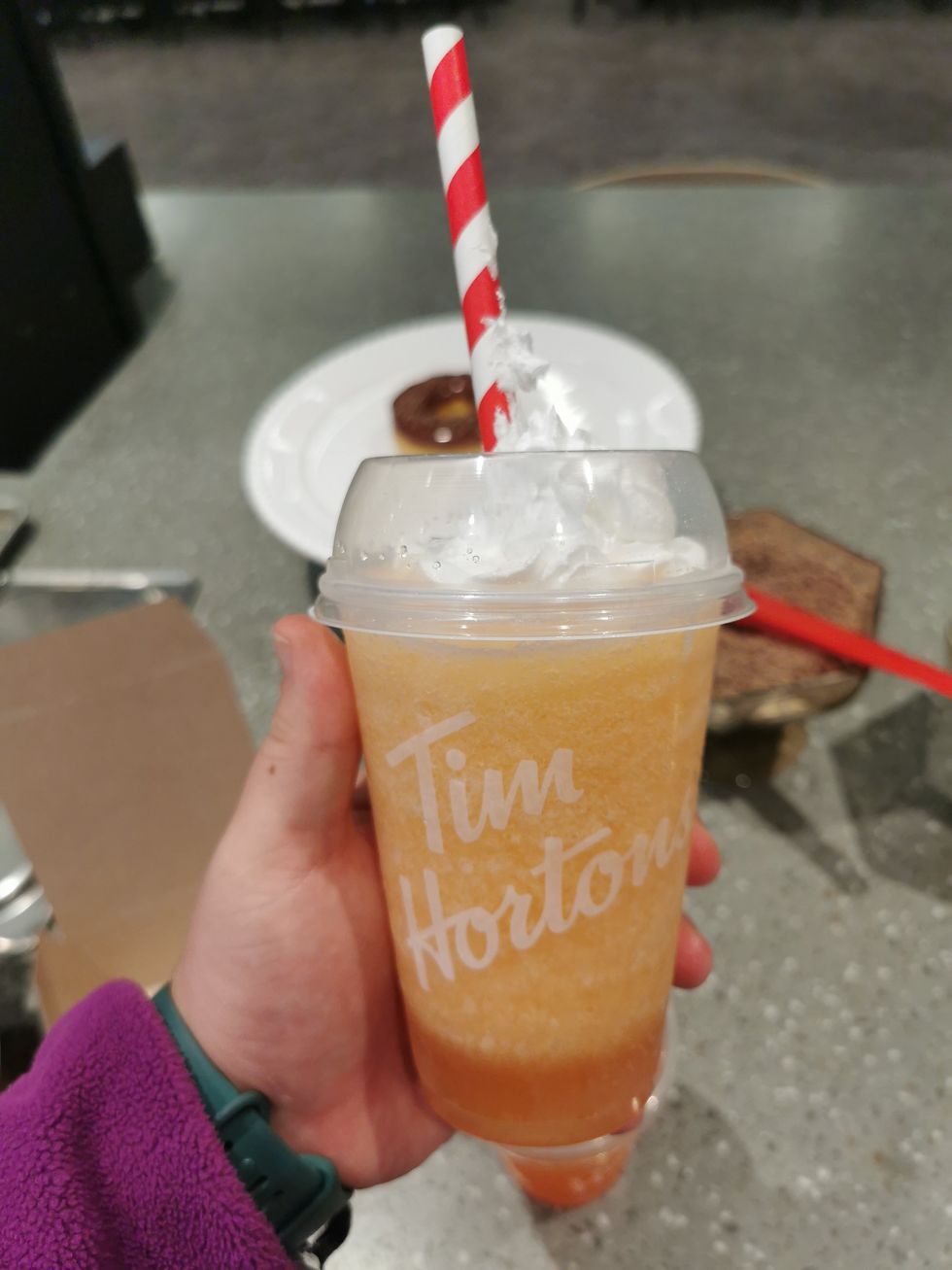 A Tim Hortons Orange Tangerine Frozen Quencher.