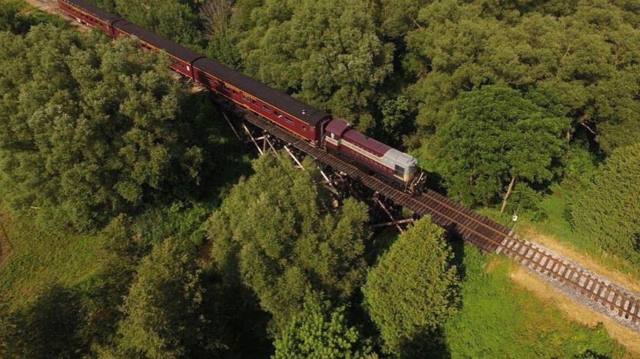 A train travelling over a bridge.