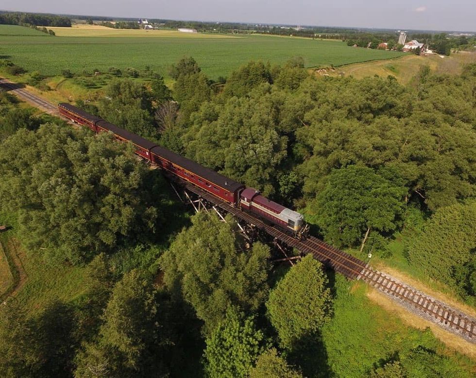 A train travelling over a bridge.
