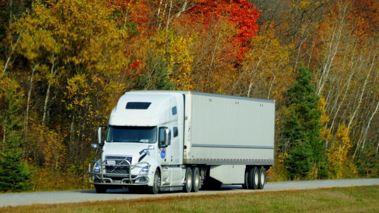 A transport truck on Highway 401.