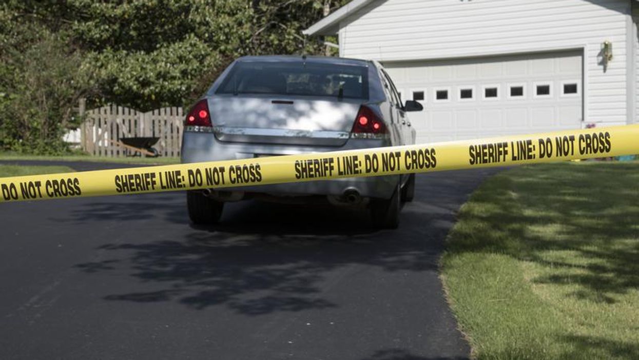 A vehicle in a driveway.