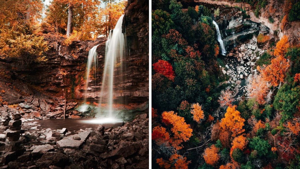A waterfall surrounded bu autumn colours.