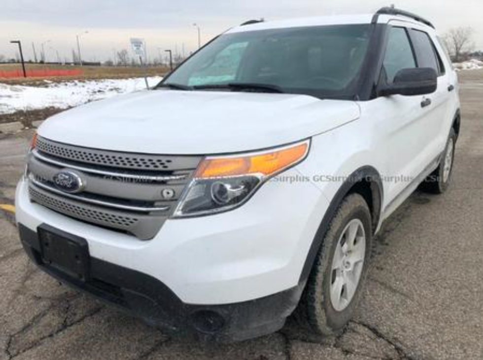 A white 2014 Ford Explorer on auction at GCSurplus.