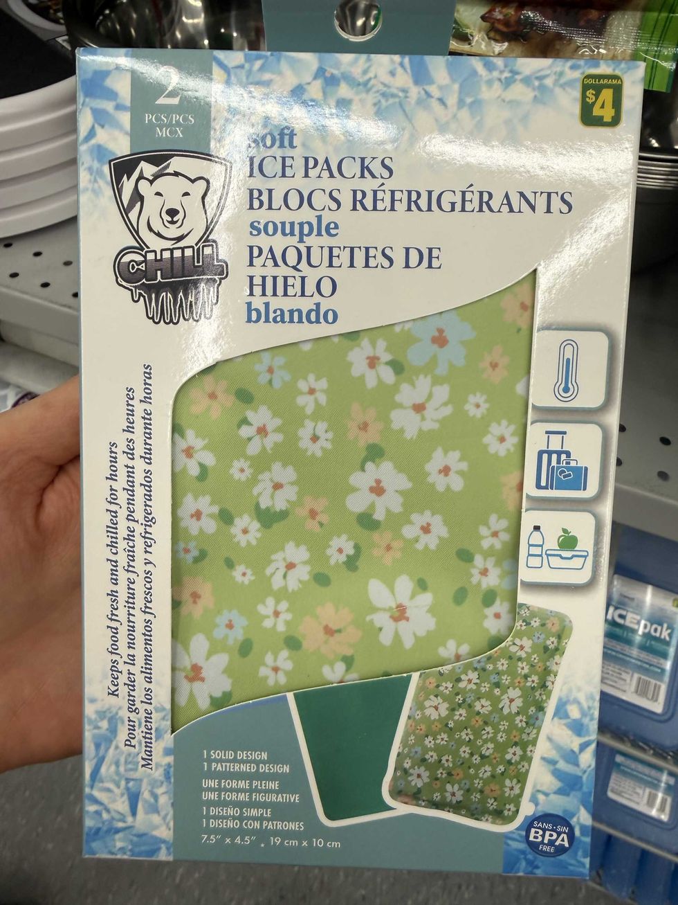 A white and blue box with a green rectangle-shaped item that has white flowers on it and the label reads soft ice packs.