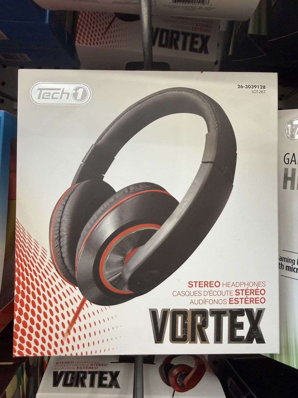 A white and red box with a pair of black headphones on the front with text that says stereo headphones Vortex.