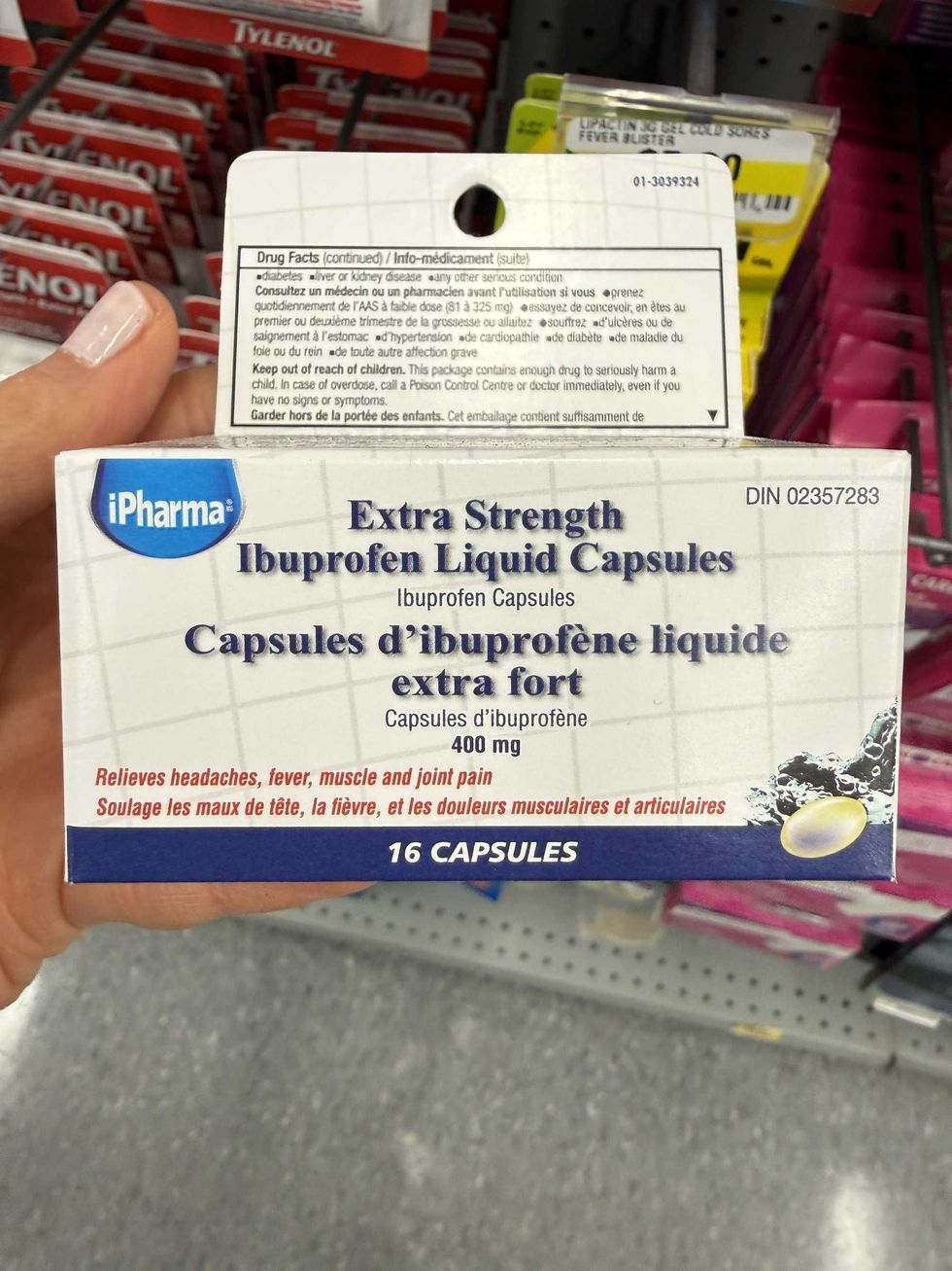 A white box that says extra strength Ibruprofen liquid capsules.