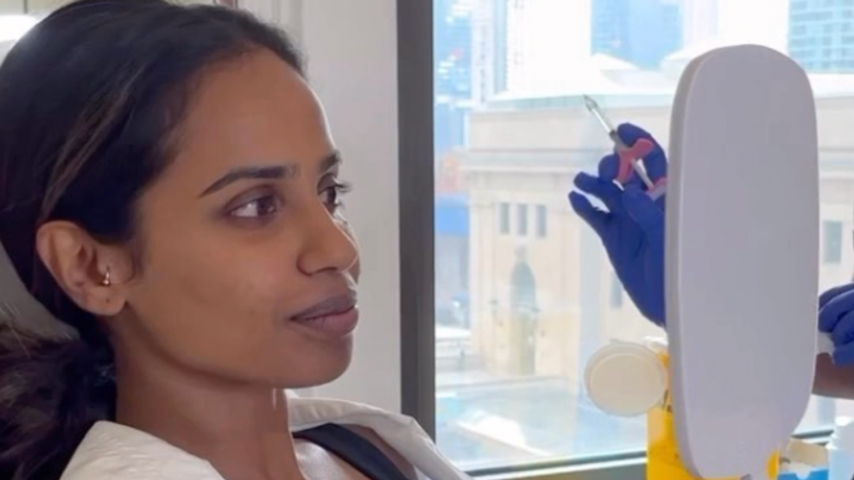 A woman getting filler.