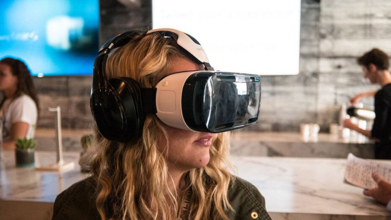 A woman in a VR headset