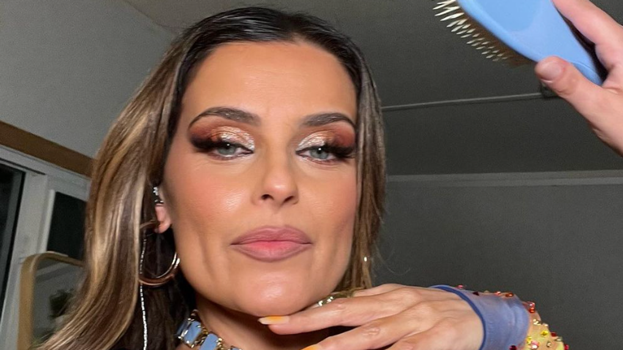 A woman posing for the camera.