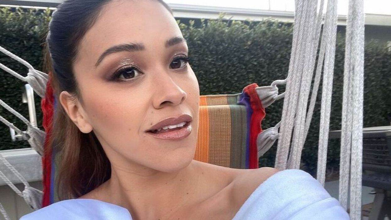 A woman taking a selfie.