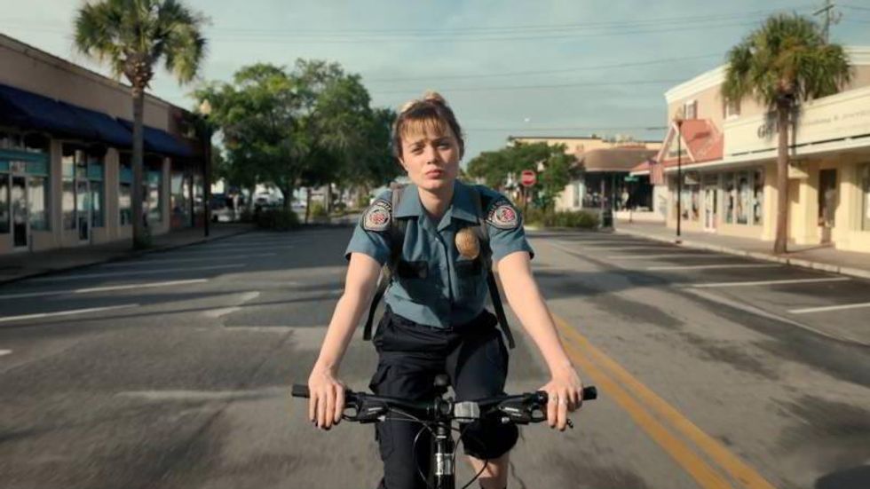 Actress Bella Heathcote riding a bike in a scene filmed in Brunswick, GA.