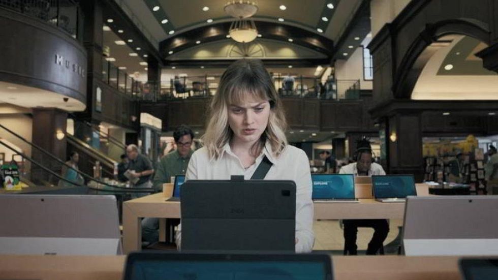 Actress Bella Heathcote works on a tablet in 'Pieces of Her.'