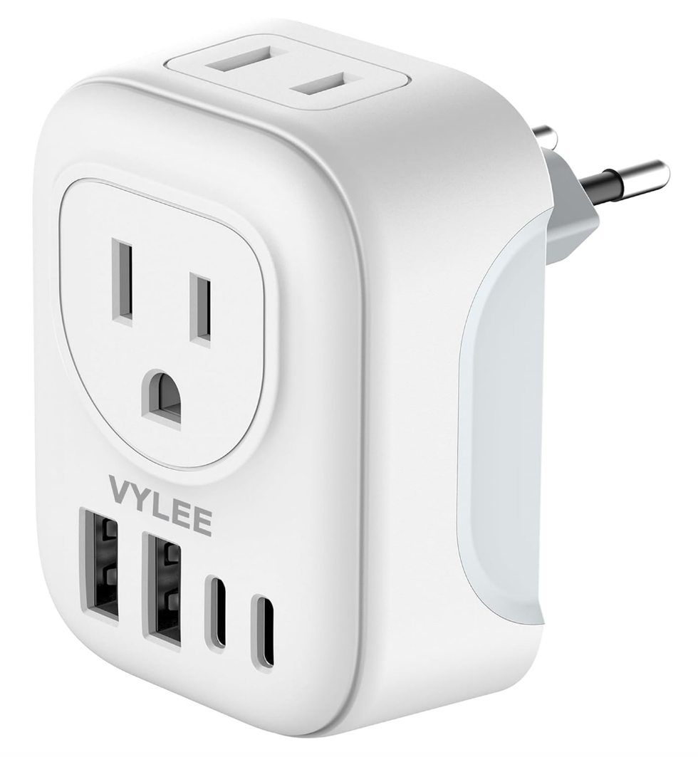 Adaptateur de prise de voyage avec 4 prises AC, 2 ports USB.