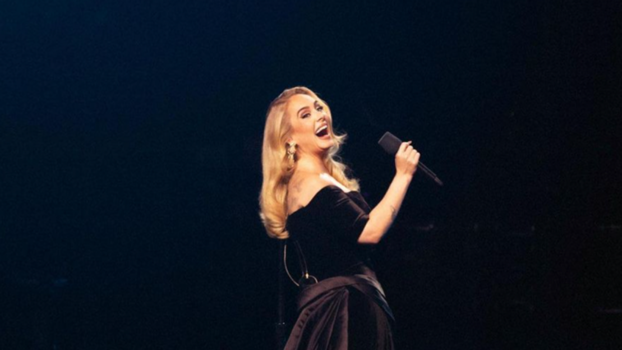Adele performing on stage.