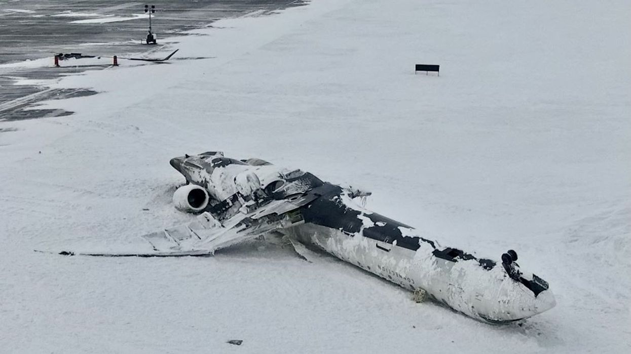Aerial view of the wreckage of a Delta plane at Pearson Airport.