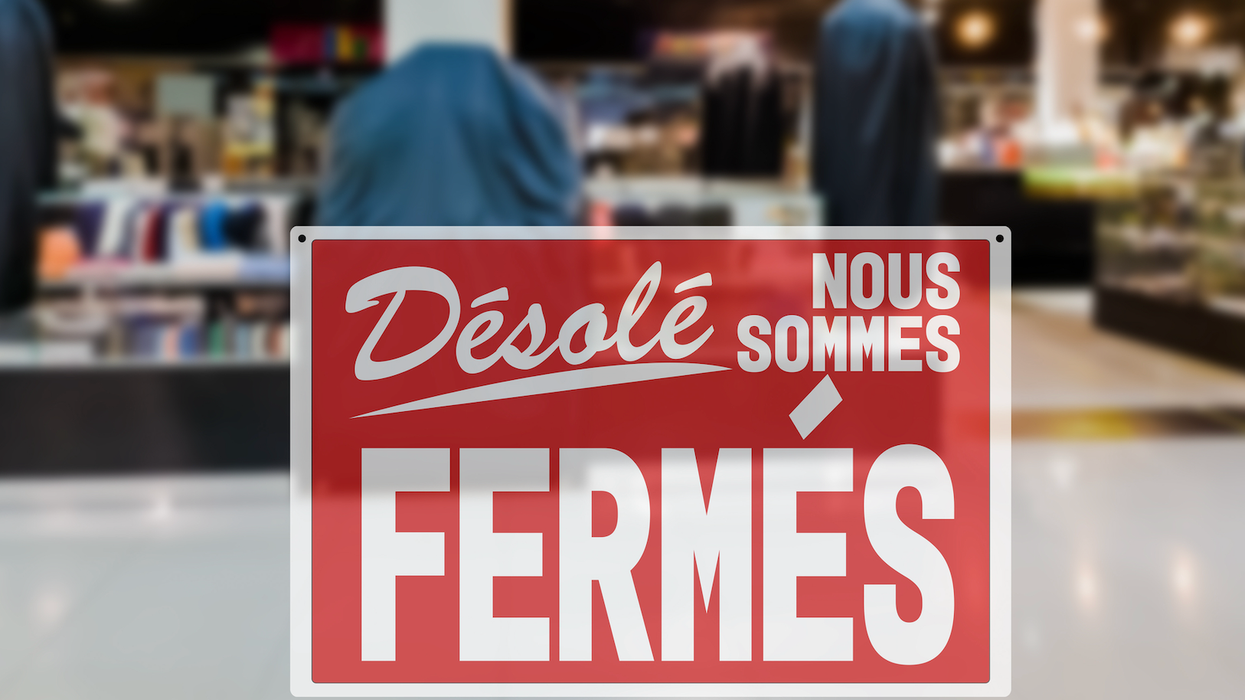 Affiche d'un magasin fermé.