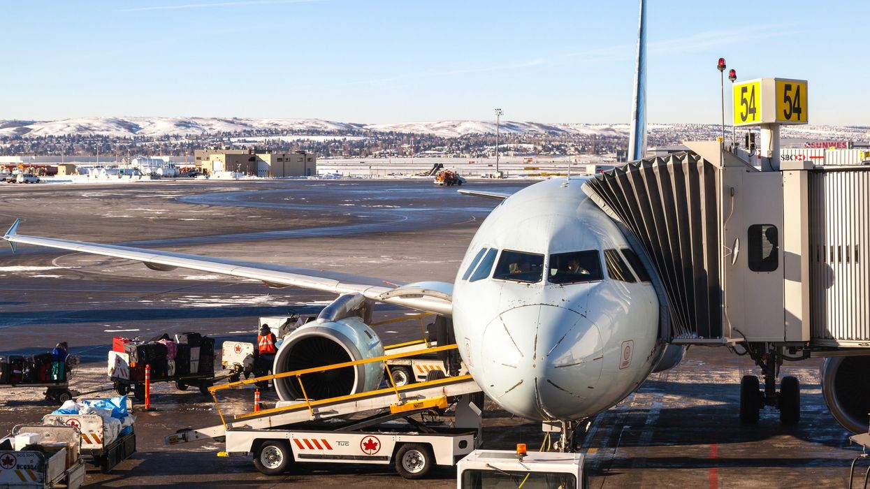 Air Canada plane at Calgary airport (illustrative).