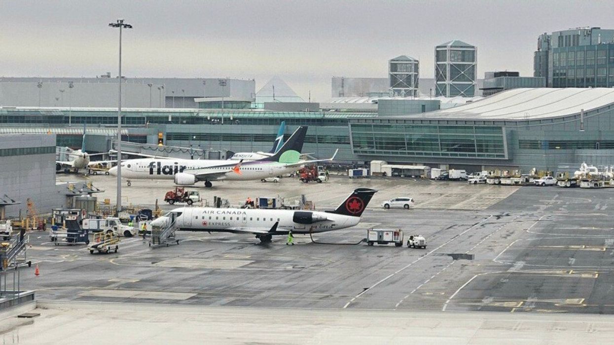 Aircraft parked at the terminal at Toronto's Pearson Airport.