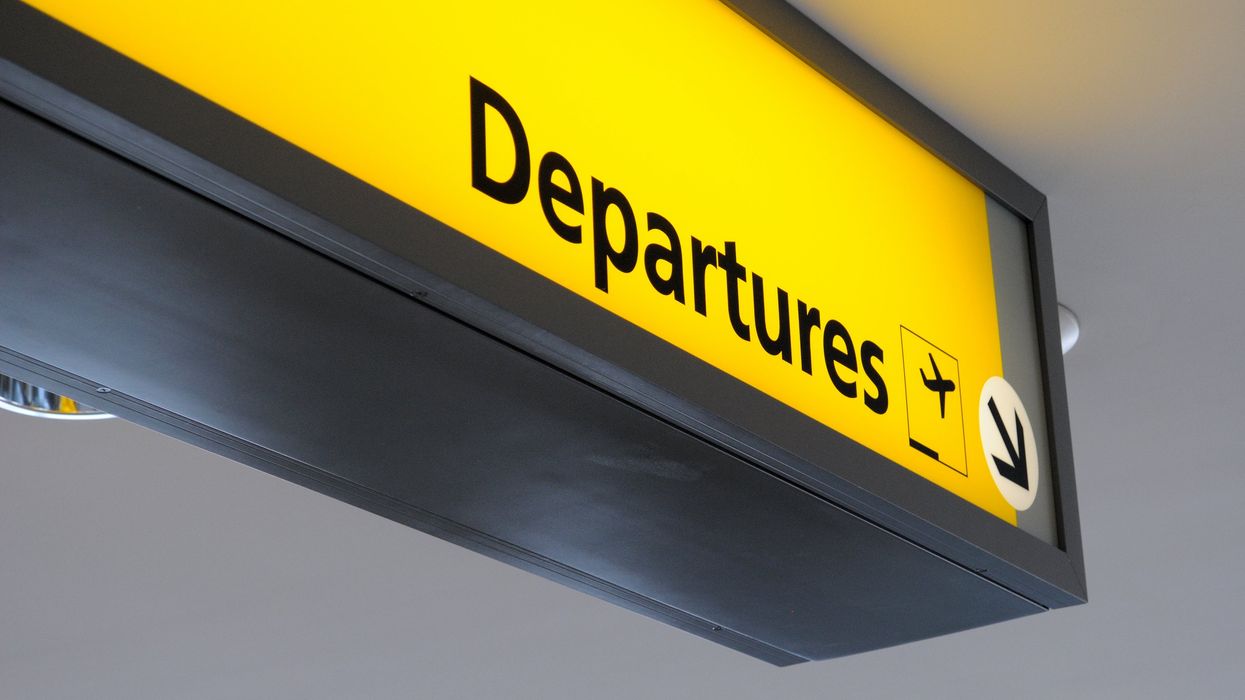 Airport departures sign.