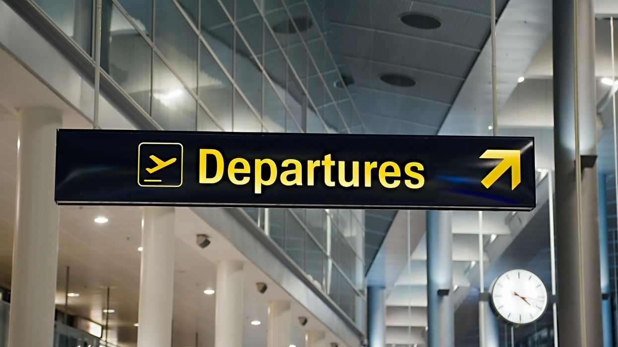 Airport departures sign.
