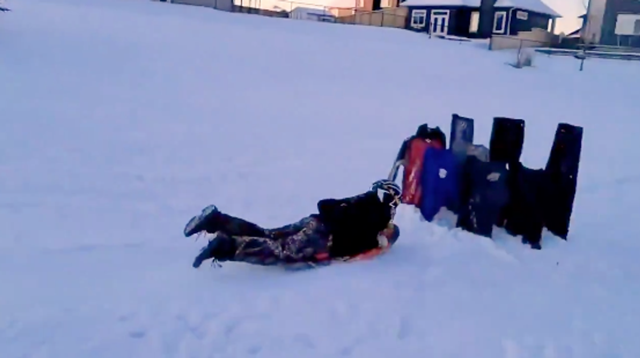 Alberta Polar Vortex Video Shows A Guy Toboggan 'Bowling' Into Frozen-Solid Clothing
