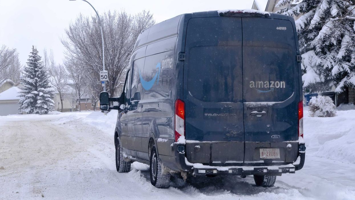 amazon truck on a snow-covered street in canada