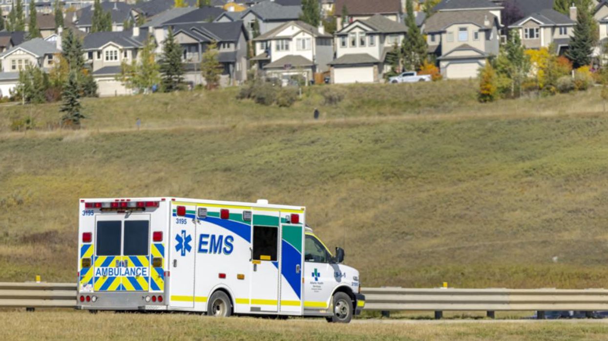 Ambulance driving on a road.