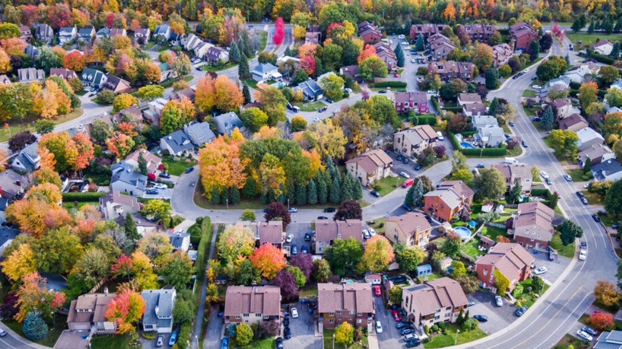 An aerial view of a neighbourhood during the fall season.