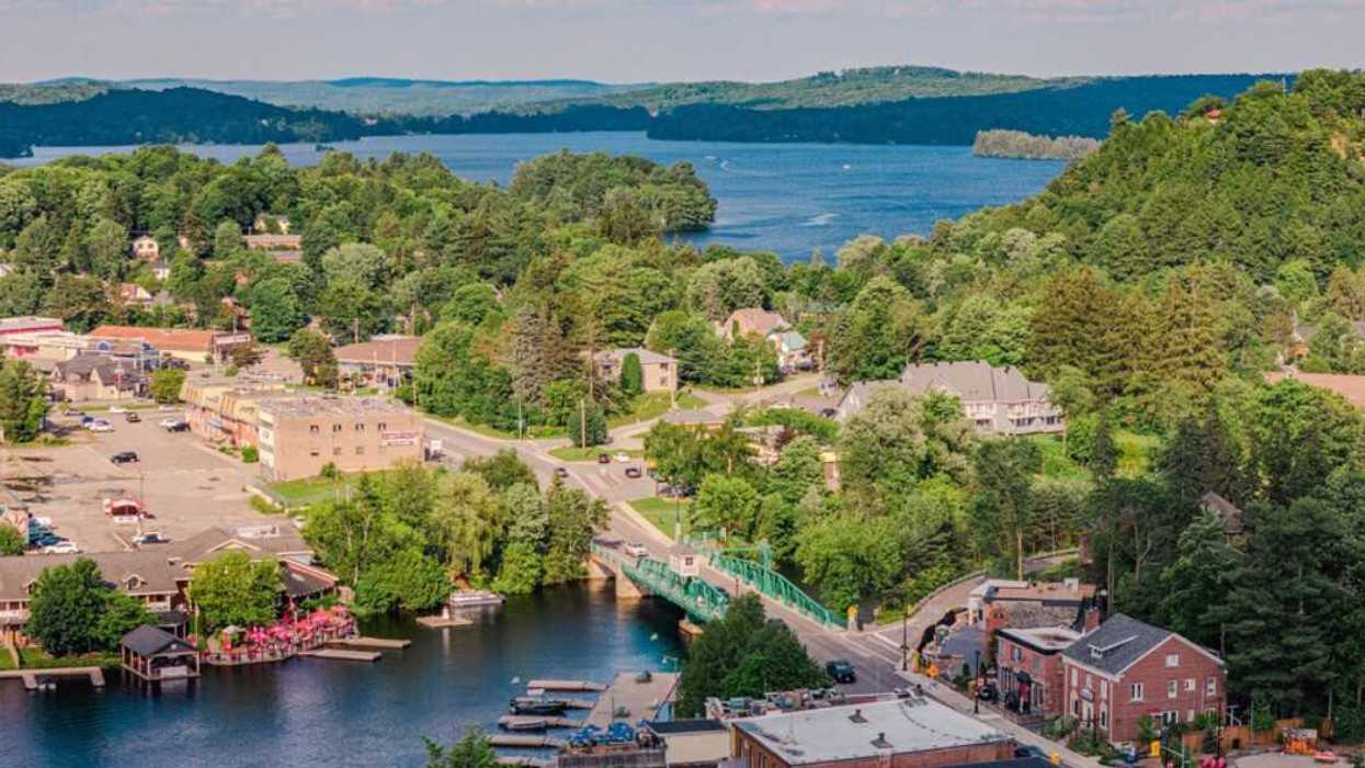 An aerial view of a town with lakes.