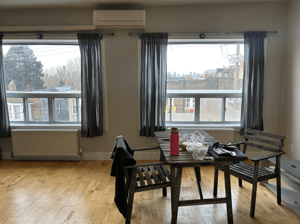 An apartment with a table.