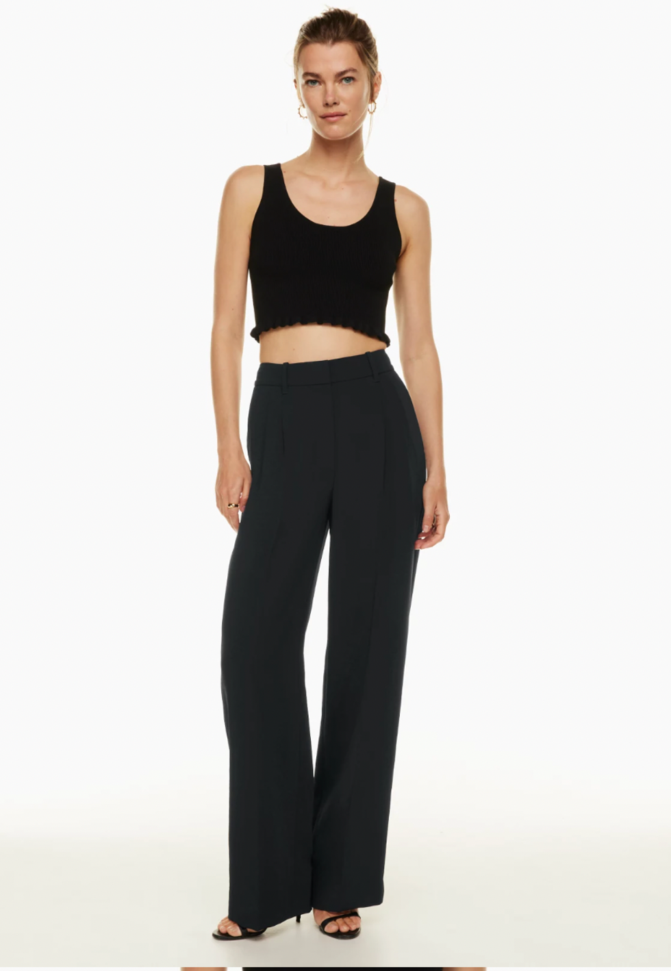 An Aritzia model wearing The Effortless Pant.